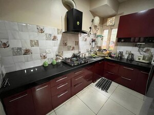 Kitchen in 4 BHK Apartment at Tarika CGHS, Sector 43 – for Sale