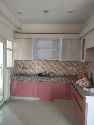 Kitchen in 2 BHK Apartment at Gaur City 2 - 12th Avenue, Sector 16c Greater Noida – for Rent