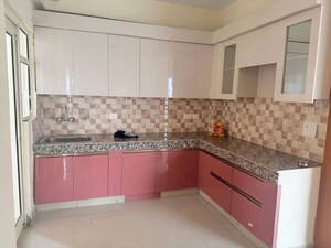 Kitchen in 2 BHK Apartment at Gaur City 2 - 12th Avenue, Sector 16c Greater Noida – for Rent