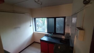 Kitchen in 2 BHK Apartment at Sakai Mauli, Naigaon West – for Rent