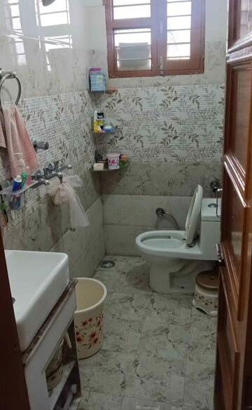 Bathroom in 3 BHK Apartment at Dhakoli – for Sale