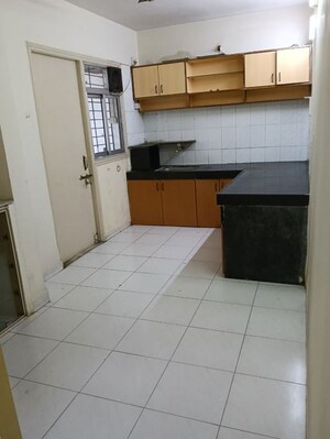 Kitchen in 2 BHK Apartment at Ganesh Baug, Sinhagad Road – for Rent