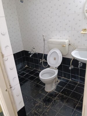 Bathroom in 2 BHK Apartment at Ganesh Baug, Sinhagad Road – for Rent
