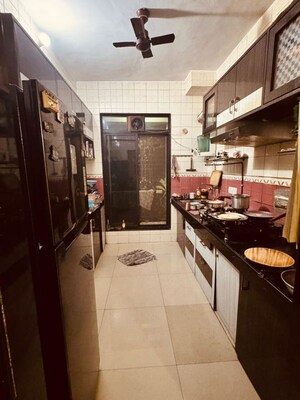 Kitchen in 2 BHK Apartment at Soham Exotica, Kharghar – for Rent