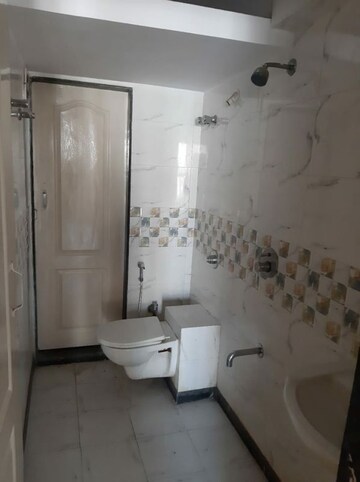 Bathroom in 2 BHK Apartment at Nav Aasawari CHS, Andheri East – for Sale