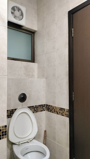 Bathroom in 3 BHK Apartment at Oberoi Realty Woods, Goregaon East – for Rent