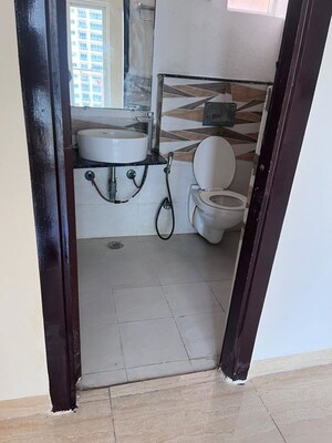 Bathroom in 3 BHK Apartment at Gaur Sportswood, Sector 79 – for Rent