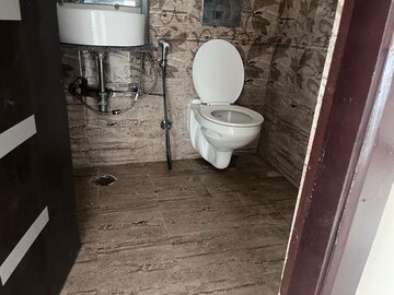 Bathroom in 3 BHK Apartment at Gaur Sportswood, Sector 79 – for Rent