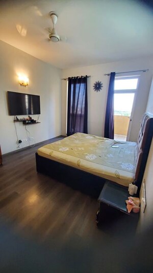Bedroom in 3.5 BHK Apartment at Emaar The Palm Drive-Palm Studios, Sector 66 – for Sale