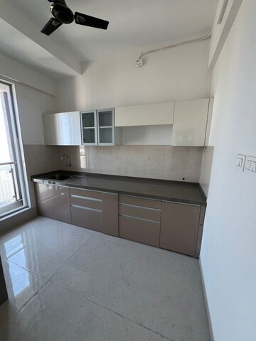 Kitchen in 3 BHK Apartment at Rosa Manhattan, Ghodbunder Road – for Sale