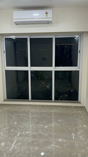 Living Room in 1 BHK Apartment at LnT Veridian, Powai – for Rent