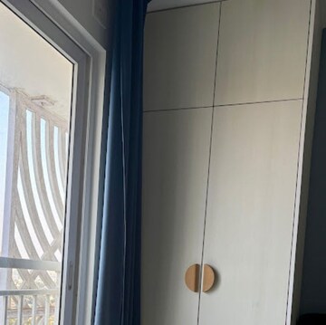 Building Lobby in 2 BHK Apartment at Puravankara Palm Beach, Essel Gardens – for Rent