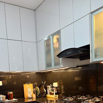 Kitchen in 2 BHK Apartment at Puravankara Palm Beach, Essel Gardens – for Rent