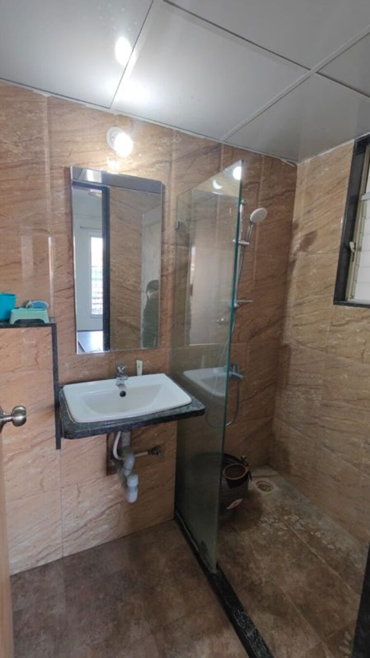 Bathroom, abhinav-pebbles-urbania 2 Bedroom 1000 Sq.Ft. Apartment In Bavdhan Pune 9721626