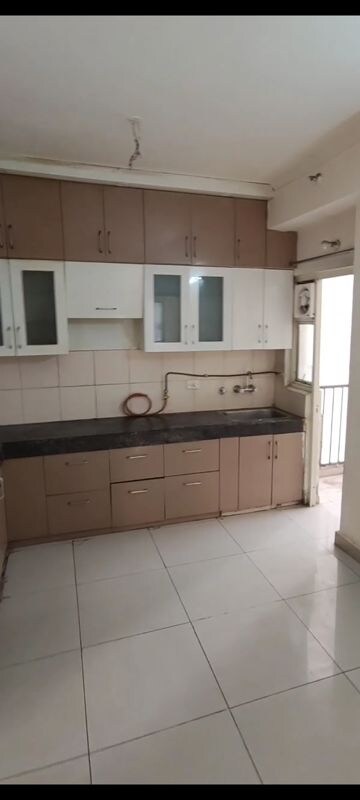 Kitchen in 3 BHK Apartment at Panchsheel Greens, Sector 16 Greater Noida – for Rent