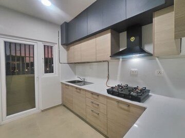 Kitchen in 2 BHK Apartment at Bhartiya Nikoo Homes Phase 2, Thanisandra Main Road – for Rent