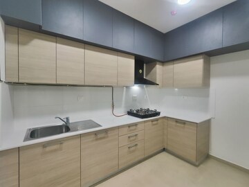 Kitchen in 2 BHK Apartment at Bhartiya Nikoo Homes Phase 2, Thanisandra Main Road – for Rent