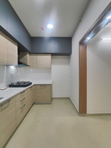 Kitchen in 2 BHK Apartment at Bhartiya Nikoo Homes Phase 2, Thanisandra Main Road – for Rent