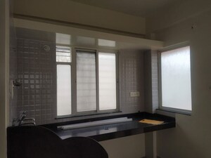 Kitchen in 1 BHK Apartment at Varanasi Society, Warje – for Sale