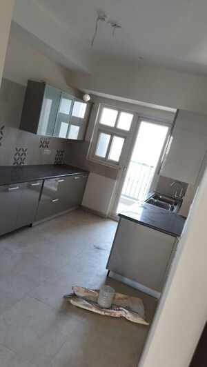 Kitchen in 3 BHK Apartment at Adani M2K Oyster Grande, Sector 102 – for Rent