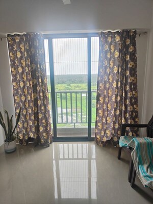 Living Room in 1 BHK Apartment at Shapoorji Pallonji Joyville, Virar West – for Rent