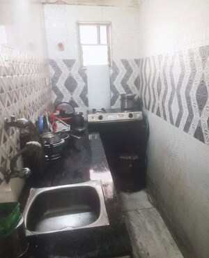 Kitchen in 2 BHK Apartment at Ashram Para – for Sale