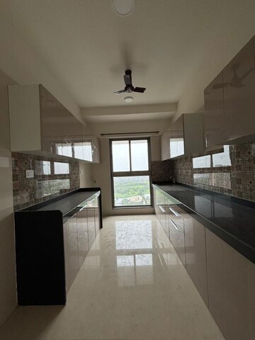 Kitchen in 2 BHK Apartment at Rajesh Raj Infinia, Malad West – for Rent