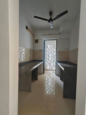 Living Room in 2 BHK Apartment at Lodha Lakeshore Greens, Dombivli East – for Sale