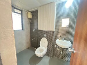 Bathroom in 2 BHK Apartment at Lodha Lakeshore Greens, Dombivli East – for Rent