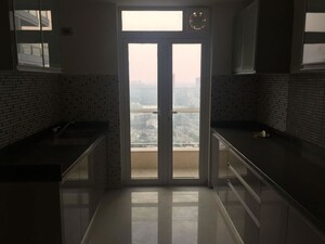 Kitchen in 2 BHK Apartment at Omkar Alta Monte, Malad East – for Rent