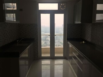 Kitchen in 2 BHK Apartment at Omkar Alta Monte, Malad East – for Rent