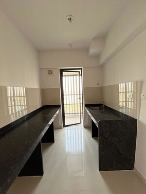 Kitchen in 2.5 BHK Apartment at Lodha Palava Downtown, Dombivli East – for Sale