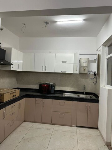 Kitchen in 2 BHK Apartment at Rishita Manhattan, Gomti Nagar – for Rent