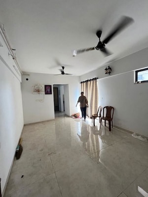 Living Room in 1 BHK Apartment at Lodha Palava City Lakeshore Greens, Dombivli East – for Sale
