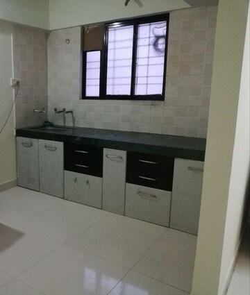 Kitchen in 2 BHK Apartment at Heena Vijaya Residency, Kharadi – for Rent