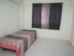 Bedroom in 2 BHK Apartment at Heena Vijaya Residency, Kharadi – for Rent