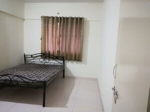 Bedroom in 2 BHK Apartment at Heena Vijaya Residency, Kharadi – for Rent