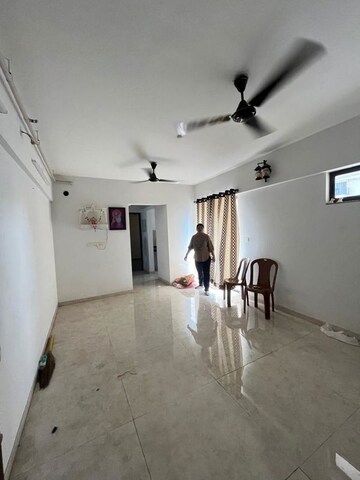 Living Room in 1 BHK Apartment at Lodha Palava City Lakeshore Greens, Dombivli East – for Rent