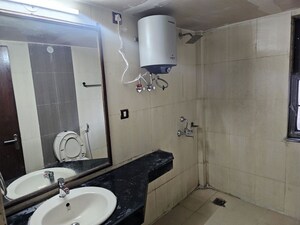 Bathroom in 4 BHK Apartment at AWHO Township Gurjinder Vihar, Omega Ii Greater Noida – for Rent