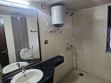 Bathroom in 4 BHK Apartment at AWHO Township Gurjinder Vihar, Omega Ii Greater Noida – for Rent