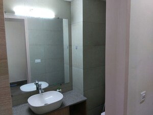 Bathroom in Studio Apartment at Gaur Runway Suites, Gaur Yamuna City – for Rent