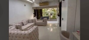 Living Room in 2 BHK Apartment at Amal Juhu Sheetal CHS, Juhu – for Sale