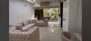 Living Room in 2 BHK Apartment at Amal Juhu Sheetal CHS, Juhu – for Sale