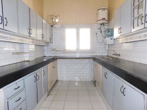 Kitchen in 4 BHK Builder Floor at Friends Colony – for Rent