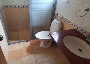 Bathroom in 4 BHK Apartment at Embassy Habitat, Palace Road – for Rent