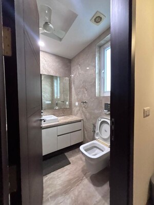 Bathroom in 4 BHK Apartment at Green Park Extension – for Rent
