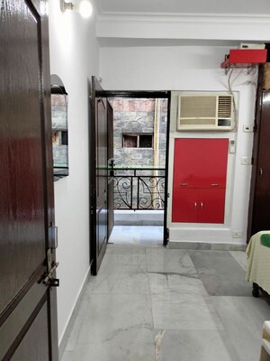 Building Lobby in 1 BHK Apartment at Khirki Extension – for Rent