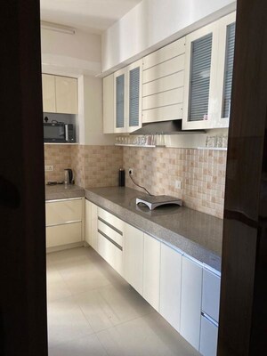 Kitchen in 4 BHK Apartment at Shalimar One World Valencia County, Gomti Nagar – for Sale