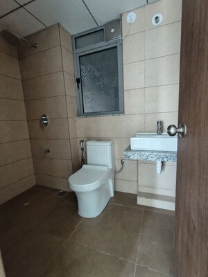 Bathroom in 1 BHK Apartment at Kalpataru Immensa, Kolshet Road – for Rent