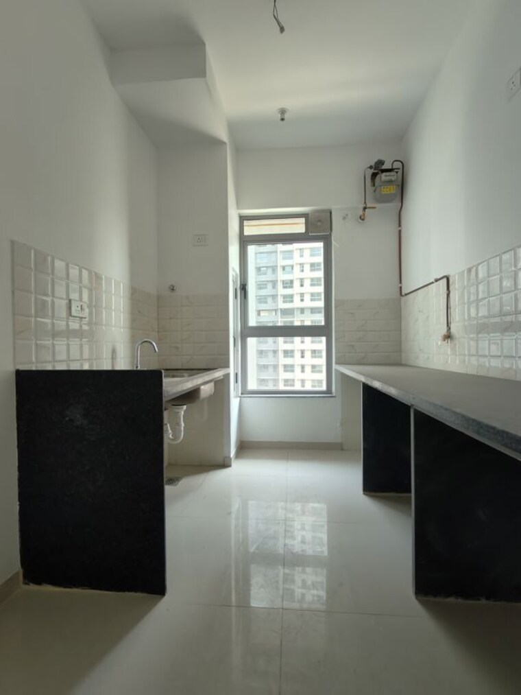 Kitchen, kalpataru-immensa 1 Bedroom 450 Sq.Ft. Apartment In Kolshet Road Thane 9722468